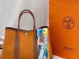 爱马仕橙女包小包(爱马仕橙色斜挎包)