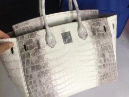 爱马仕鳄鱼皮制品怎么样啊(爱马仕鳄鱼皮是真的吗)